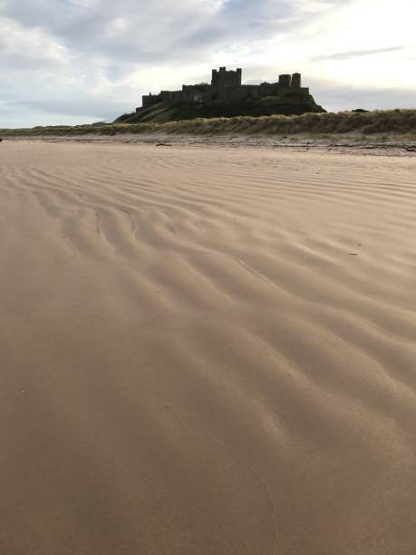 istock Patterns on sandy beach at Bamburgh Northumberland England 1394752241