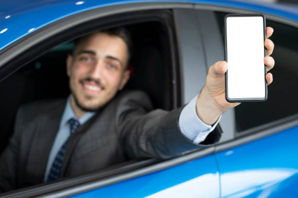 istock happy young man buying a  in new car 1394756341