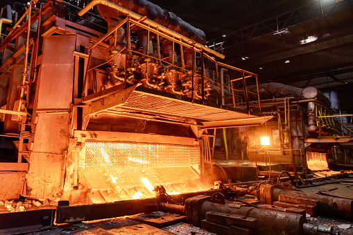 Furnace for heating metal forgings and ingots. Furnace for heating metal forgings and ingots. Bright orange glow on the hot zone.