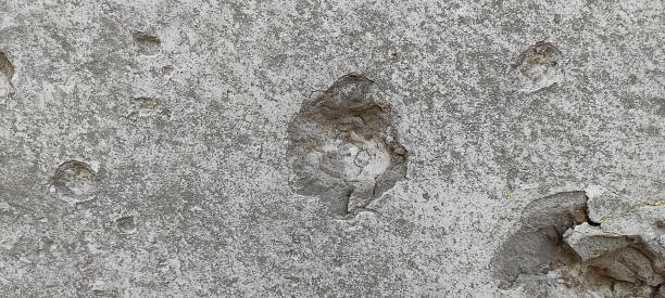 istock The wall was shattered by shell fragments. 1394758989
