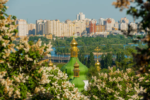 beautiful spring panorama of Kyiv from the vydubychi side overlooking the left bank beautiful spring panorama of Kyiv from the vydubychi side overlooking the left bank dnipropetrovsk stock pictures, royalty-free photos & images