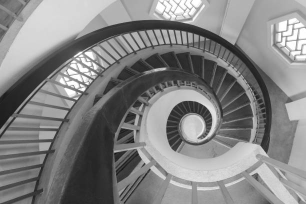 istock Overhead view of a spiral shaped staircase 1394760531