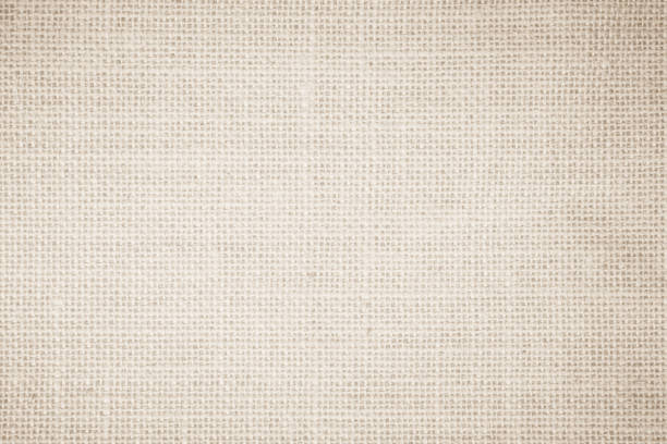 istock Jute hessian sackcloth burlap canvas woven texture background pattern in light beige cream brown color blank. Natural weaving fiber linen and cotton cloth texture as clean empty for decoration. 1394760580