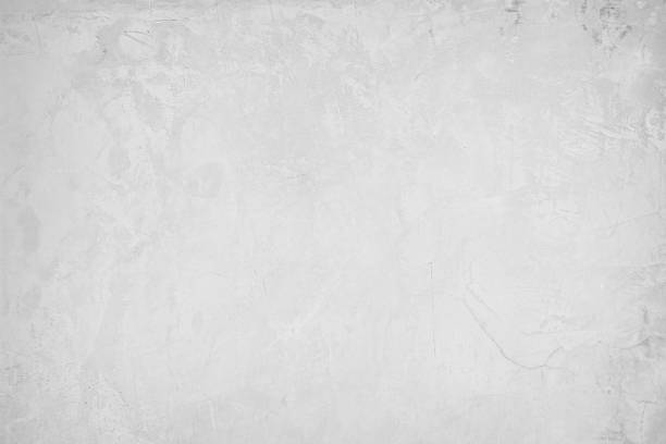 istock White concrete texture wall background. Pattern floor rough grey cement stone. Wallpaper paper  sand surface clean polished. Photo abstract gray construction old grunge for design urban decoration. 1394761589