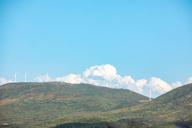 wind plant green energy at Greece mountains copy space