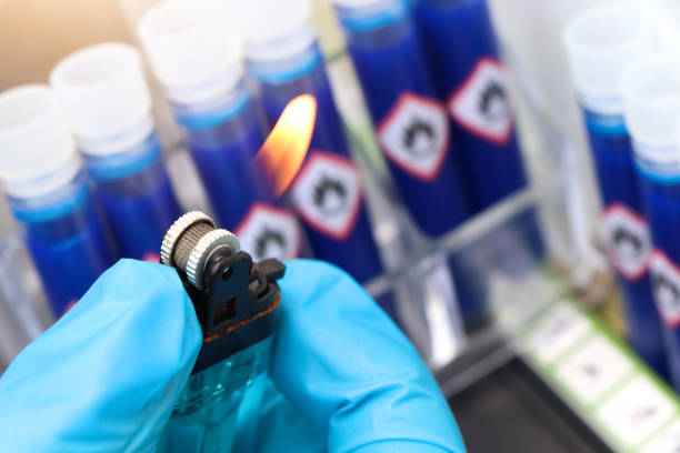 istock flammable chemicals in test tubes and symbol 1394766561