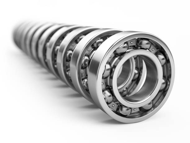 row of ball bearings isolated on white background. 3d illustration - ball bearing engineer machine part gear imagens e fotografias de stock