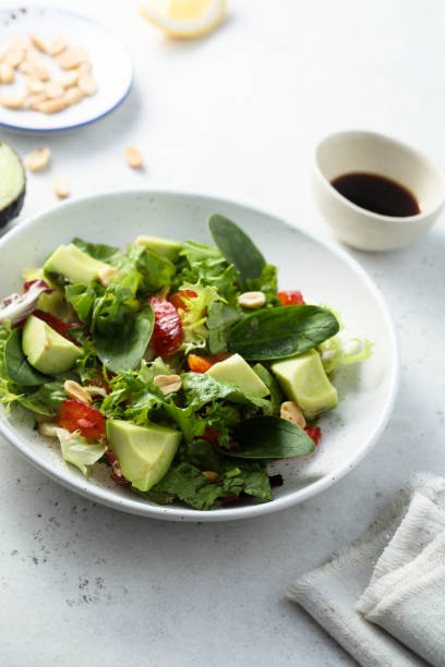 istock Salad with avocado and orange 1394766953
