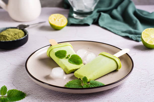 istock Vegetarian popsicle made from matcha tea, coconut milk and mint on a plate 1394769032