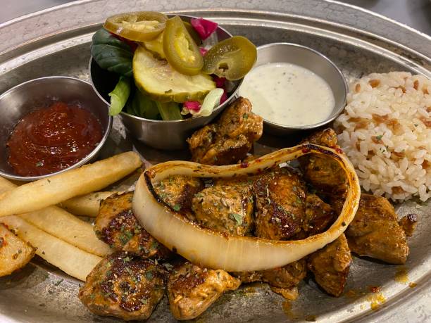 istock A Turkish Meat Dish With Garnish On A Silver Plate 1394771676