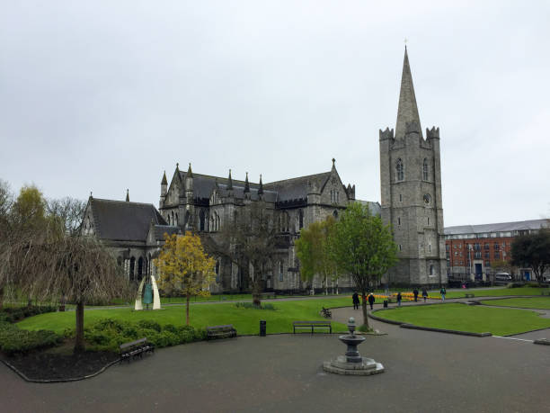The City and Trinity College Dublin, Ireland Dublin, Ireland- April 28, 2016: Dublin is the capital of Ireland Republic and the city view is very beautiful. Trinity College Dublin is a famous university in the world and its anicent library is a must see in the campus. Here is the St. Patrick's Cathedral, Dublin. trinity college library stock pictures, royalty-free photos & images