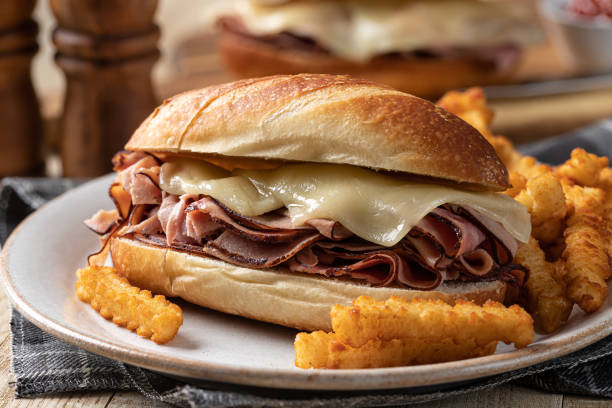 istock Hot ham and cheese submarine sandwich 1394772345