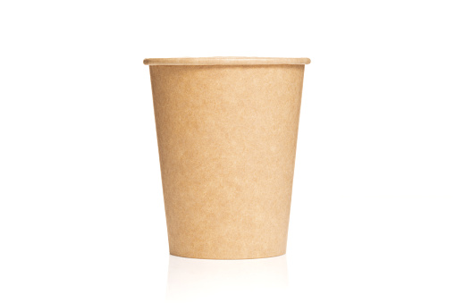 Cardboard cup from recycled craft paper on an isolated white background