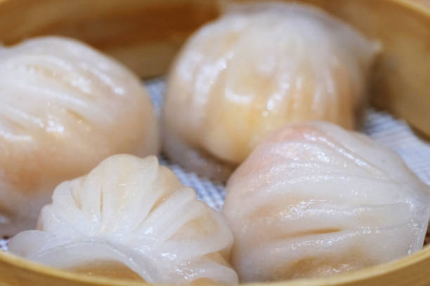 istock several Har gow (Xia jiao) in steamer. Traditional Cantonese snack 1394777771
