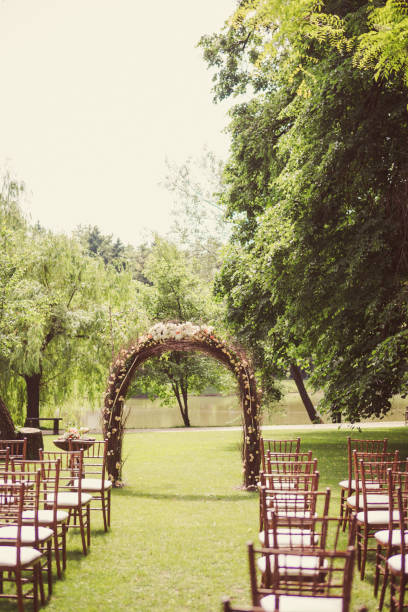 istock Stylish floral decoration of withe at wedding ceremony. 1394778922