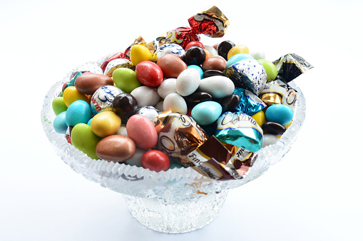 candies and chocolate in crystal bowl