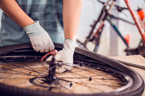 Bicycle tire care, Bike care for cyclist, Close-up.