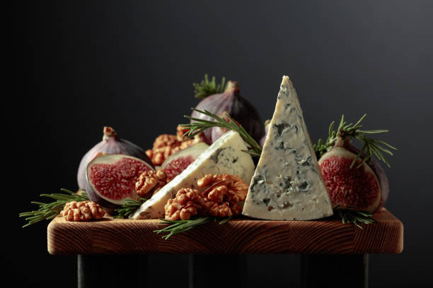 istock Blue cheese with figs, walnuts, and rosemary. 1394784767