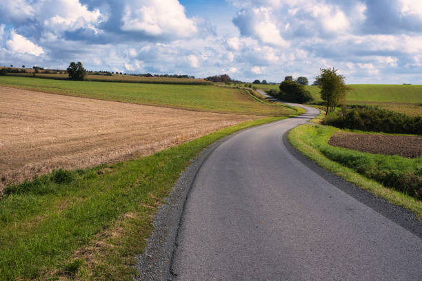 istock curvy country road 1394786695