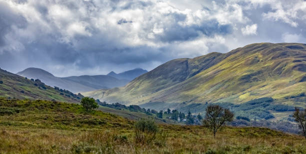 Watching the Rain Come in, Looking East from the Eastern Slope of Cow Hill near Fort William Taken from the Circular Cow Hill Walk Looking East. fort william stock pictures, royalty-free photos & images