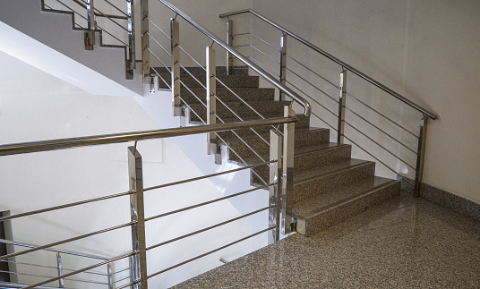 Stainless steel railing.Fall Protection. modern design of handrail and staircase