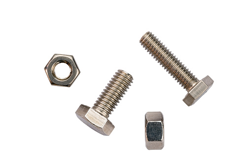 Top view of stainless steel screws and nuts isolated on white background with clipping path.