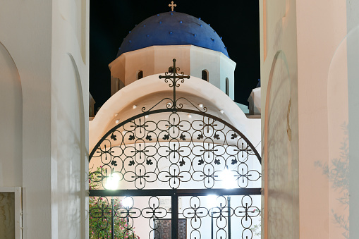 Church of the Holy Cross in the town of Emporio, Santorio, Greece at night.