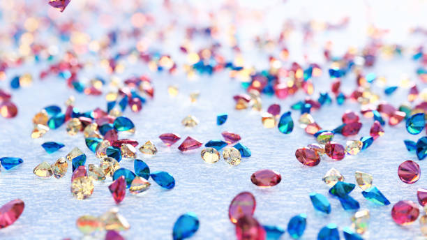 istock Topaz Rain. Pink, Yellow And Blue Topaz Falling On Light Blue Background 1394797460