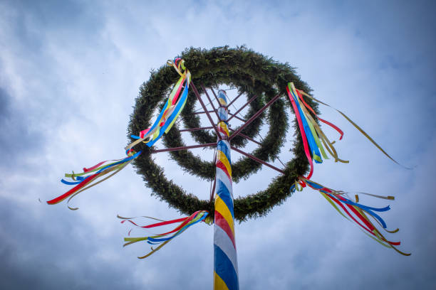 istock maypole decorated with colorful ribbons 1394798719