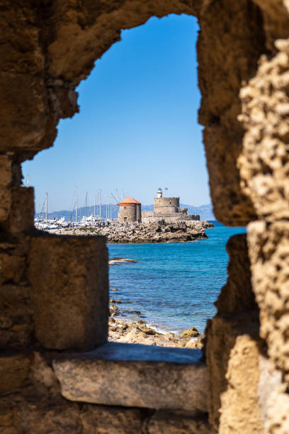 istock Rhodes Windmills view from a windows in De Naillac Tower 1394798831