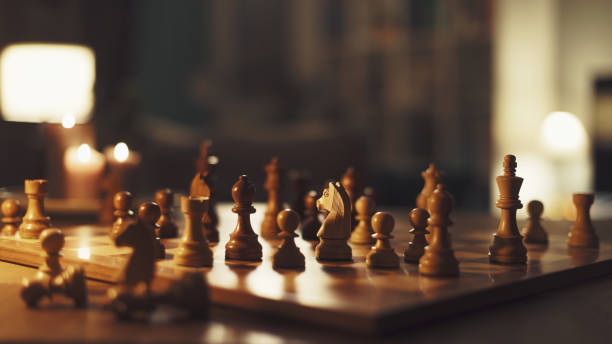 istock Luxury chess set and chessboard at home 1394803244