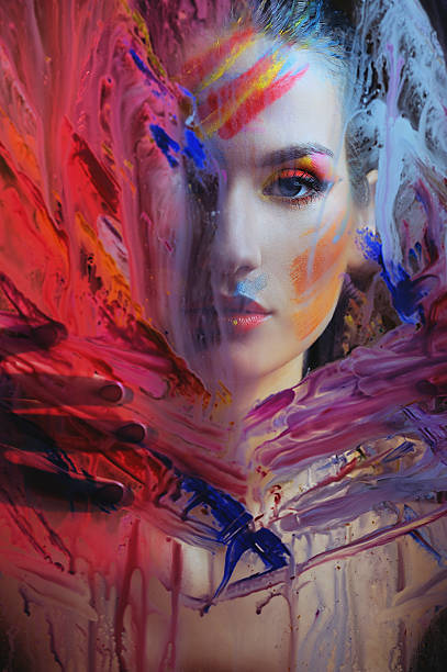 istock beautiful woman in color paint 139480414