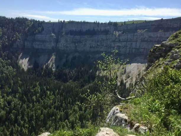 Switzerland - Canton of Neuchatel - The Creux-du-Van is a rocky cirque about 1,400 meters wide and 200 meters high. It is located on the territory of the locality of Gorgier, in the commune of La Grande Béroche, in the Littoral region, in the canton of Neuchâtel, in