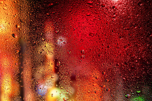 istock Condensation on the clear glass window. Water drops. Rain. Abstract background texture 1394807081