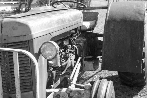 istock Old Tractor Equipment In A Field. 1394808300