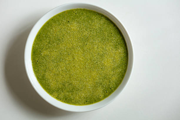 istock Spinach smoothie bowl topped with dry roasted cornmeal 1394808974