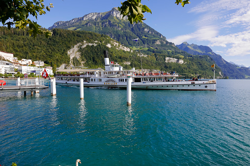Lake Lucerne, Switzerland - August 25, 2020: Schiller paddle steamer on a voyage in Lake Lucerne's waters, is on its way to the next port.