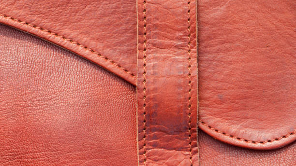 istock Flap and strap in brown leather bag detail 1394812911