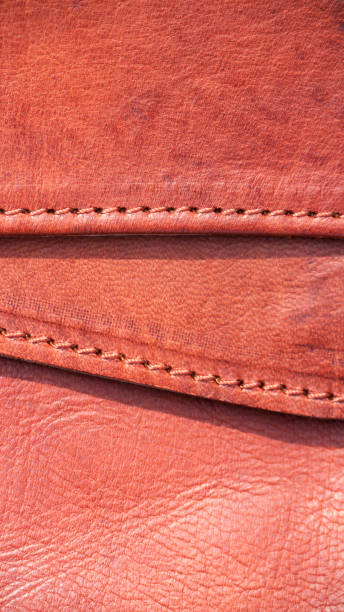 istock Flaps and pocket in brown leather bag 1394812921
