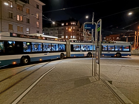 The DGT LighTram3 Trolleybus in Zurich City was made by the swiss Company Hess. The length is 24.7 Meters and the vehicle offers place for Total 155 passengers (60 Seating, 95 Standing). The Image was captured by night at Hardplatz Station .