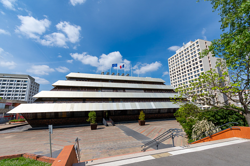 Nanterre, France - May 1, 2022: Exterior view of the town hall of Nanterre, a French city in the western suburbs of Paris located in the Hauts-de-Seine department, in the Île-de-France region