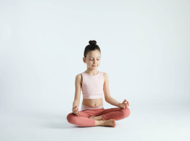 istock Cute Girl Doing Yoga 1394818849