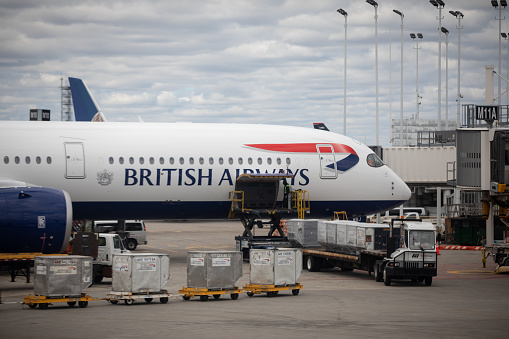 Chicago, Illinois - April 10 2022: A British Airlines airplane parked at the gate on Chicago O'Hare International Airport