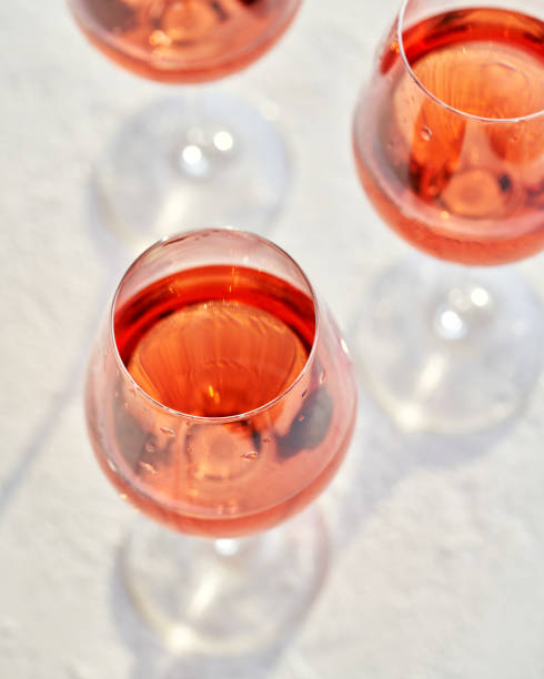 istock Glasses of rose wine on a white background 1394822002