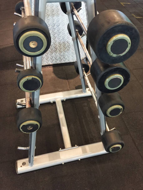 istock Barbells on the iron stand at the gym 1394823043