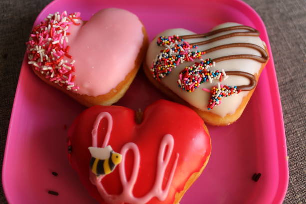 istock Valentines Day Donuts On A Pink Plate 1394827773