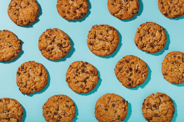 istock Oatmeal cookies on a blue background with a pattern in the form of a pattern. 1394829064