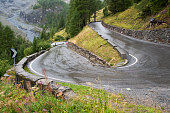 Road to the Passo Stelvio (Italy) mountain pass. Rainy weather.