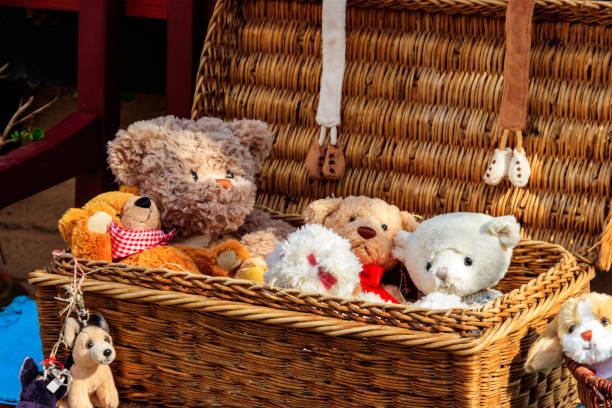 istock Stuffed toys in a wicker basket 1394834399