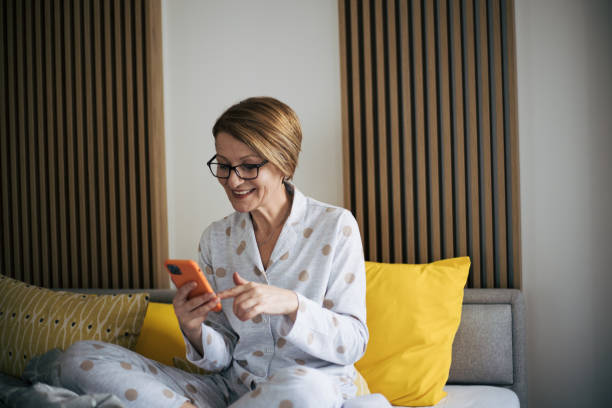 istock Senior woman is using smartphone 1394834602